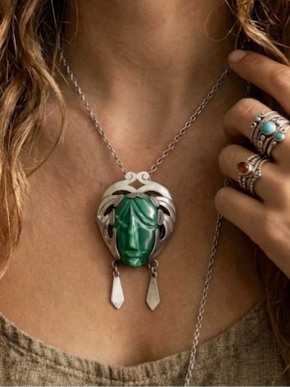 Vintage Taxco sterling silver and malachite warrior face mask pendant